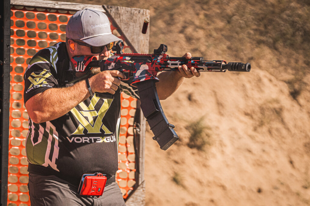 Reuben Aleckson navigating a course of fire with box fed shotgun