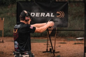 Shooter engaging targets at the USPSA Carry Optics Nationals