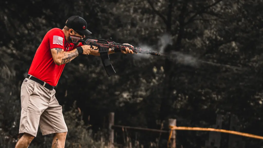 Box Fed Shotgun with shot string visible